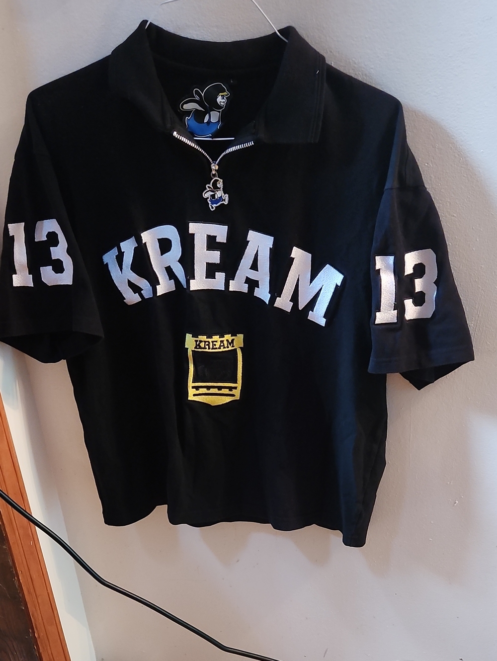 Black Short-Sleeve Polo with Zip and Applique